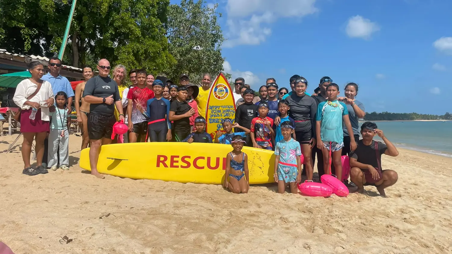 Koh Samui Surf Lifesaving Club group with rescue board