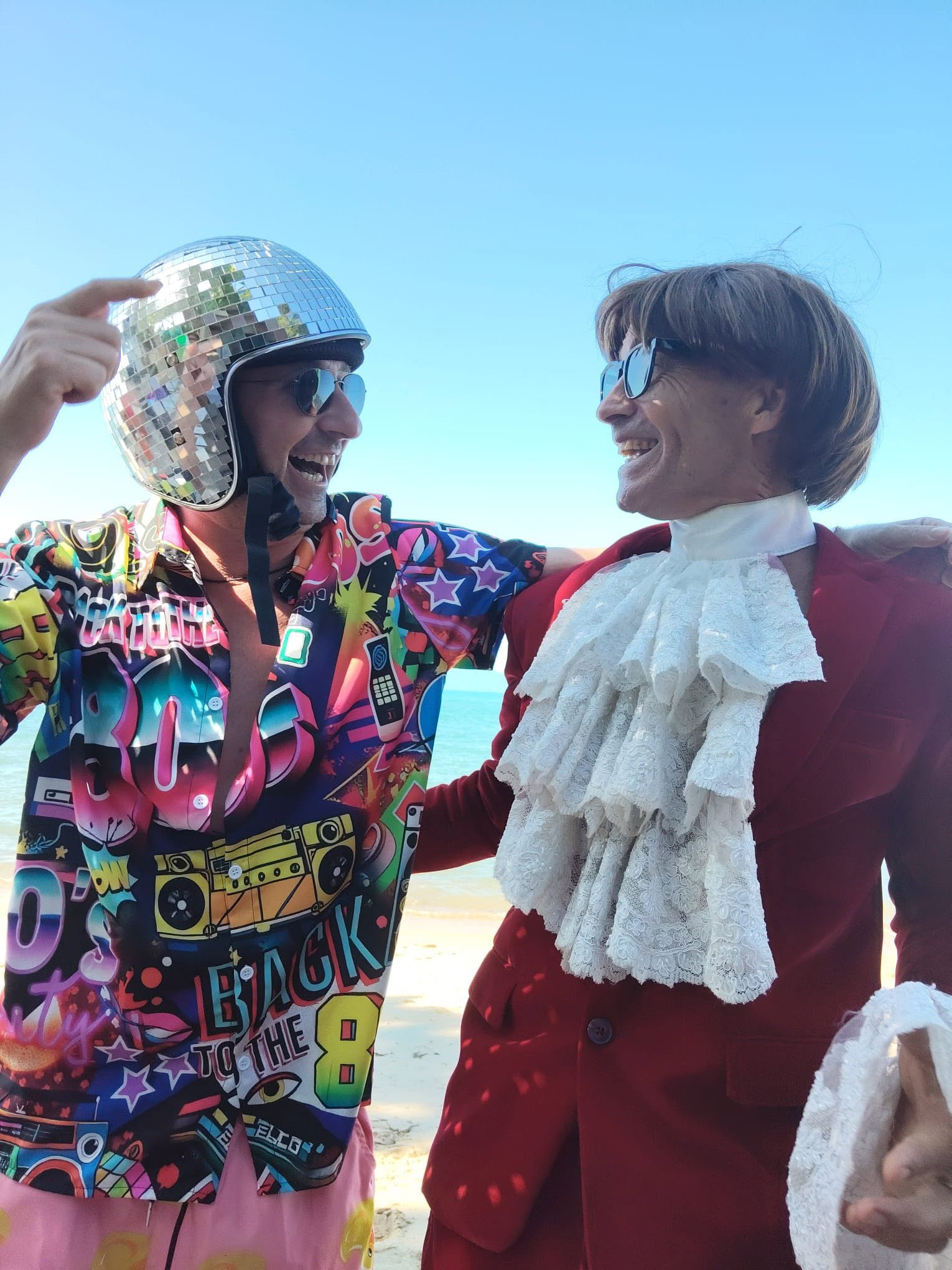Rene and Mad Max having a laugh at the Beach Party