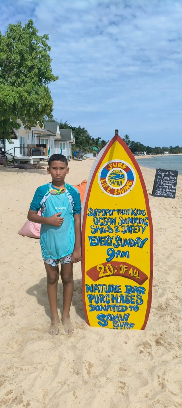 Surf Club child at the beach