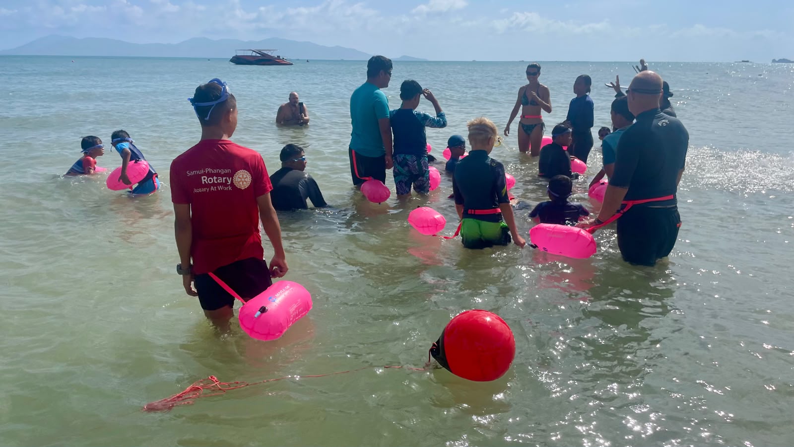 Children and volunteers practising water safety on 19 July 2026