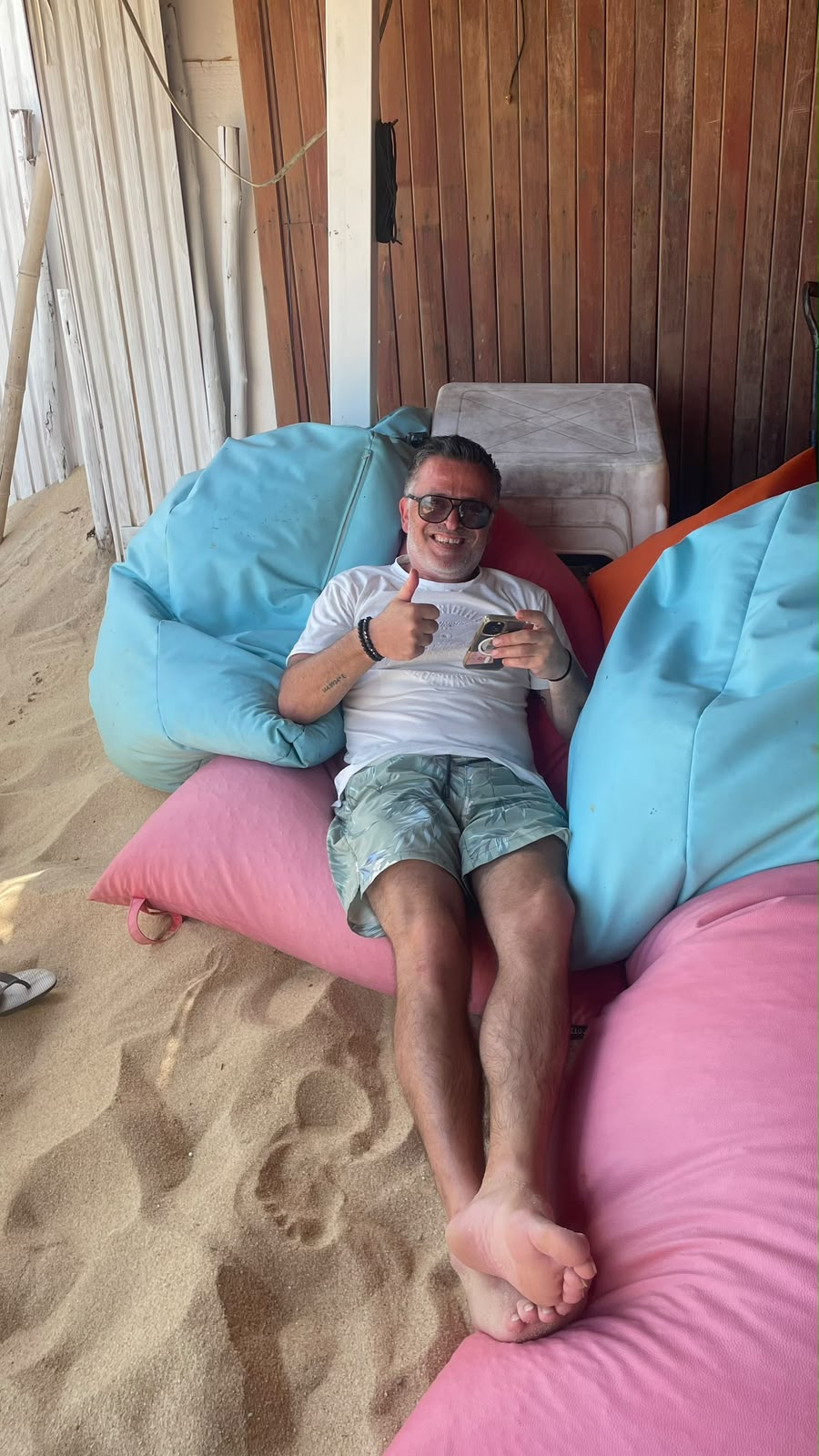 George relaxing on a beanbag at the Surf Club